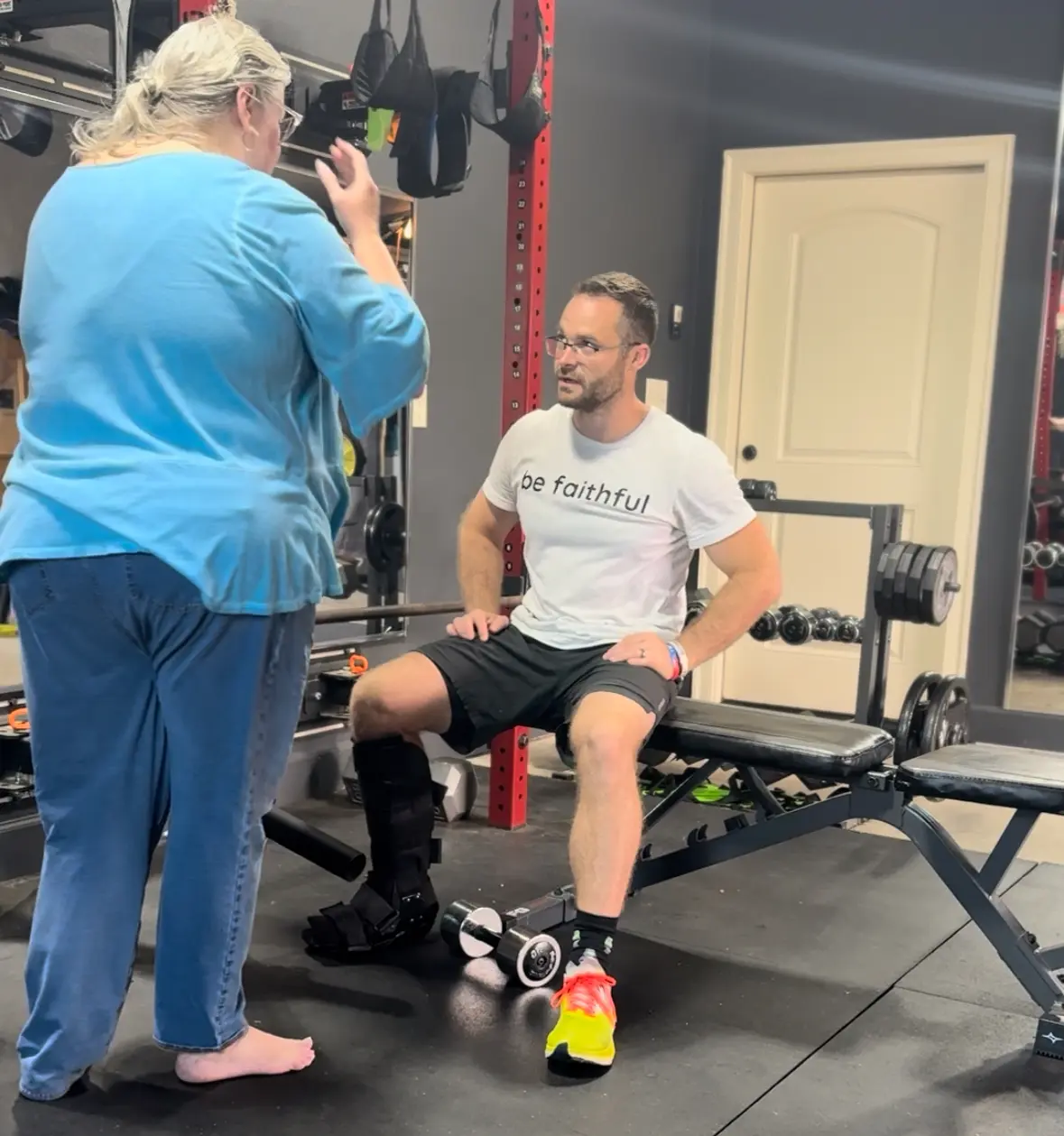Coach Alex working with a fitness client