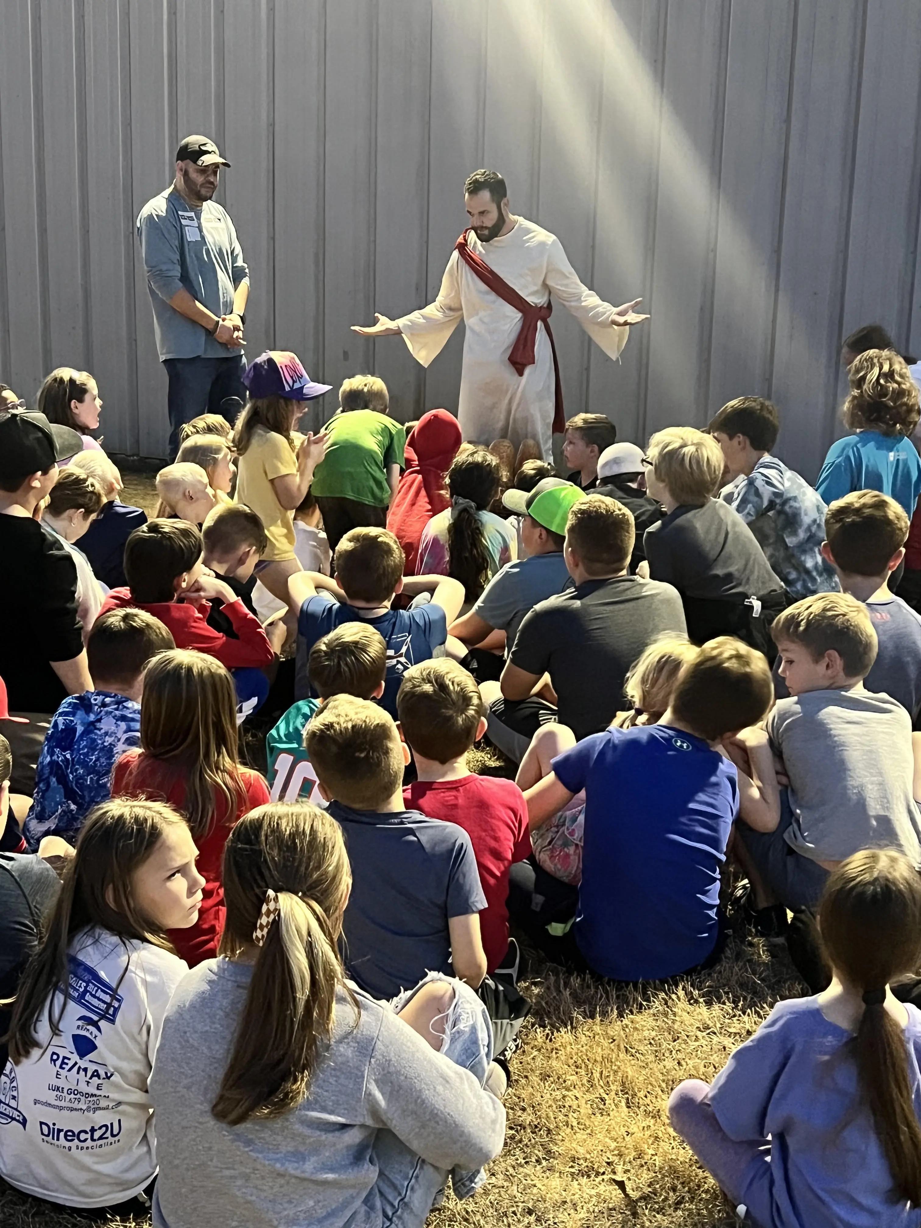 Coach Alex teaching children